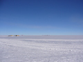 #2: View North along the Prime Meridian: visitor's centre tents, parked aircrafts, our camp (centre)