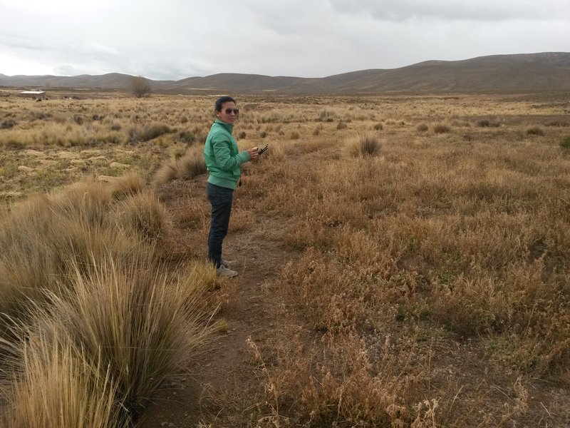 Anita standing on the confluence point