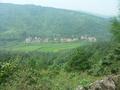 #9: Row of houses and paddy fields west of confluence.