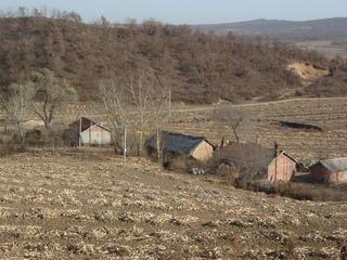 #1: The CP is located just in the middle of the picture between the dark roof and the road