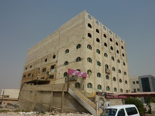 #1: View of the building on the CP, with a new construction on top