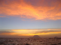 #10: A breathtaking sunset on the approach to Yokoate-jima.  Worried about typhoon waves and landing possibilities on a wild island in the pitch darkness that would soon envelop us, we were nearly oblivious to the beauty around us and later didn't even remembe