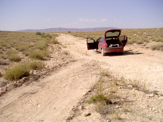 Our car marks the closest point of the road to the Confluence. View to the West