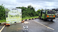 #11: Fake monument at the wrong place (on the right: our buses)