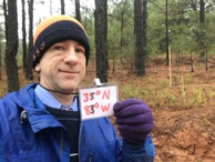 #2: Standing in the woods in the rain and mud near 33 North 83 West. 