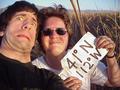 #3: Joseph Kerski and Shannon White in the salt marsh; hand self portrait; no solid ground to set a tripod on!